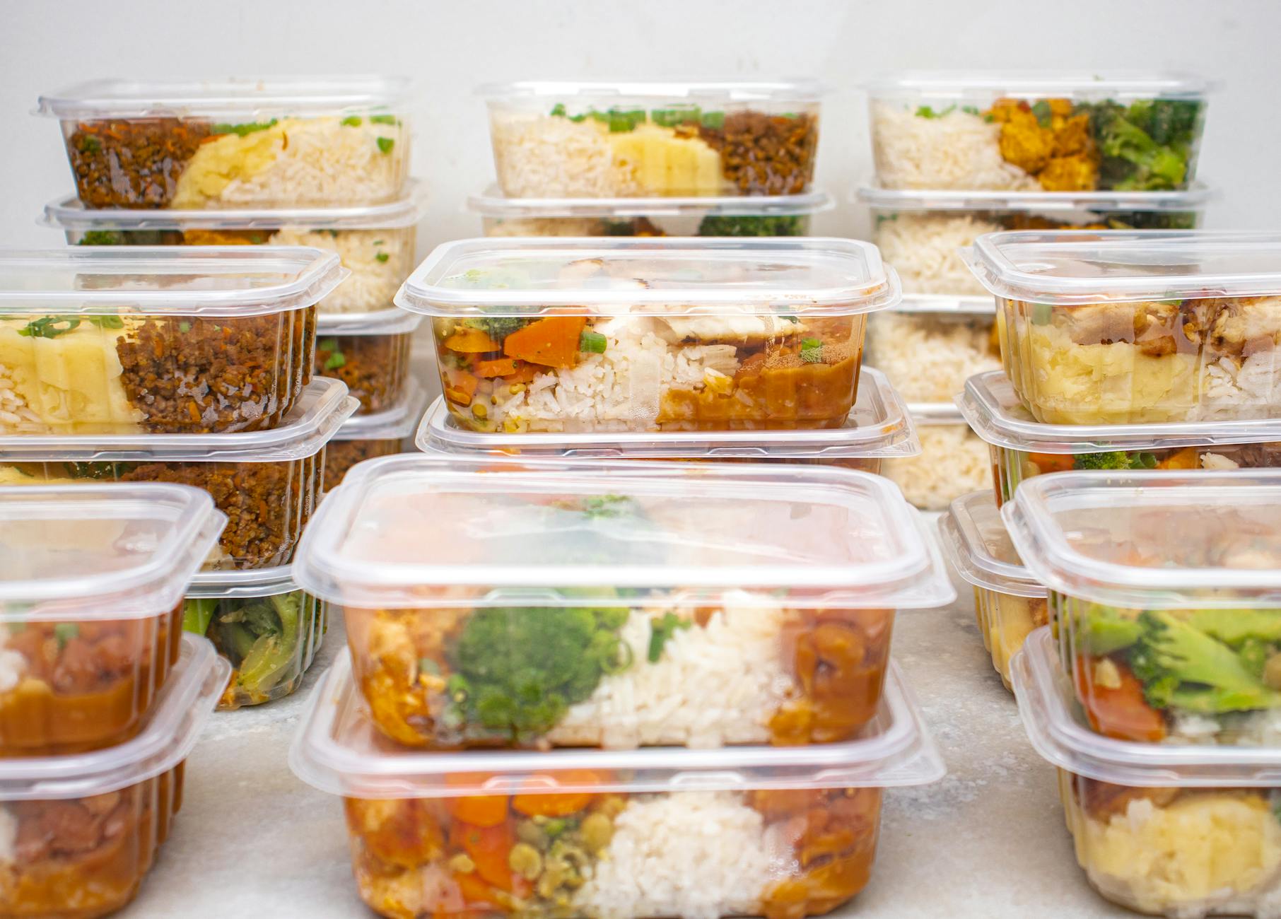 Meal Prep Containers for Reducing Food Waste Meal prep containers filled with rice and vegetables ready for storage or freezing to cut food waste
