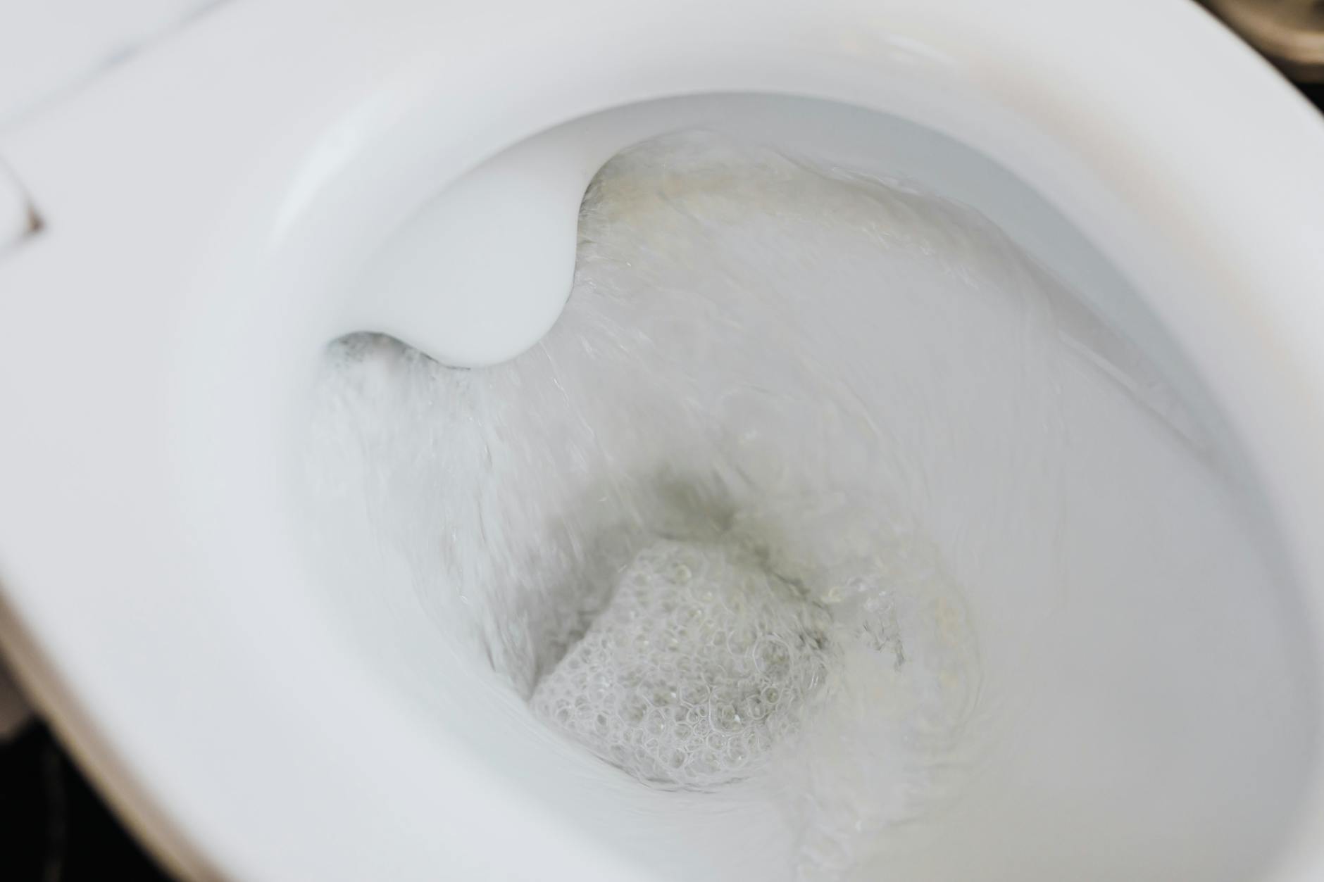 How to Keep a Toilet Bowl Clean Longer Clean toilet bowl with clear flushing water
