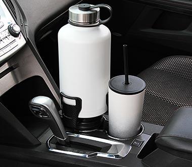 CupStation Installed in Vehicle Cupholder 2026 CupStation installed in car cupholder holding an oversized tumbler while driving