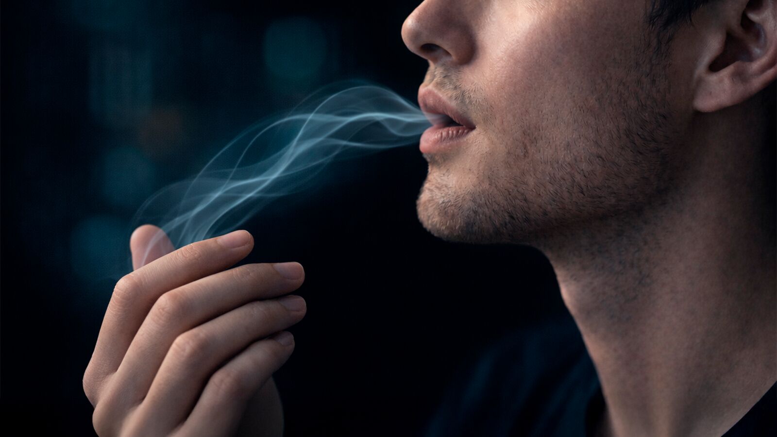 CAPNOS Legura User Experience 2026 Man using CAPNOS Legura with satisfied expression in modern interior setting