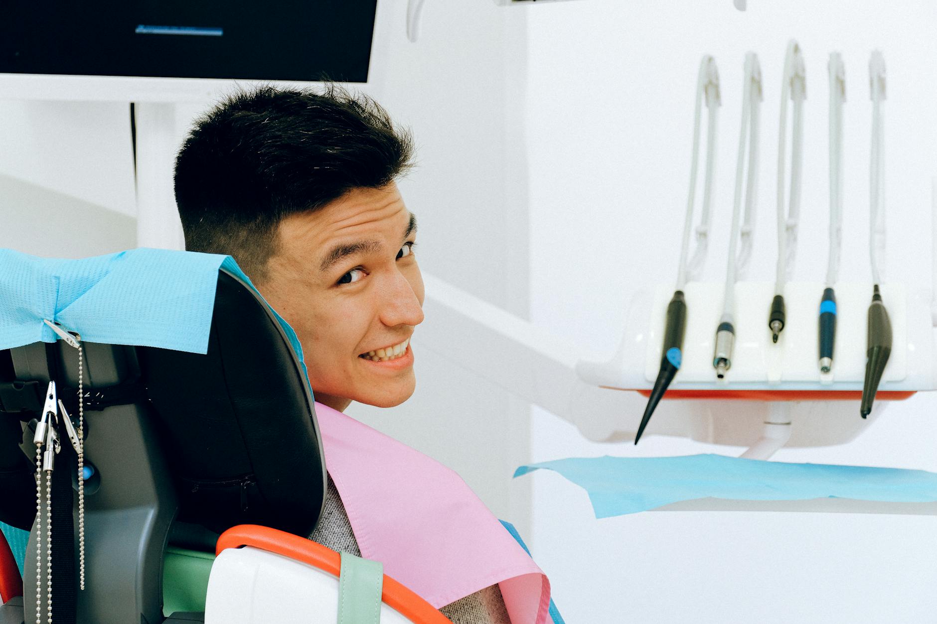 Relaxed Patient in Dental Chair 2026 Man sitting calmly in a dental chair, demonstrating that it is possible to feel relaxed at the dentist