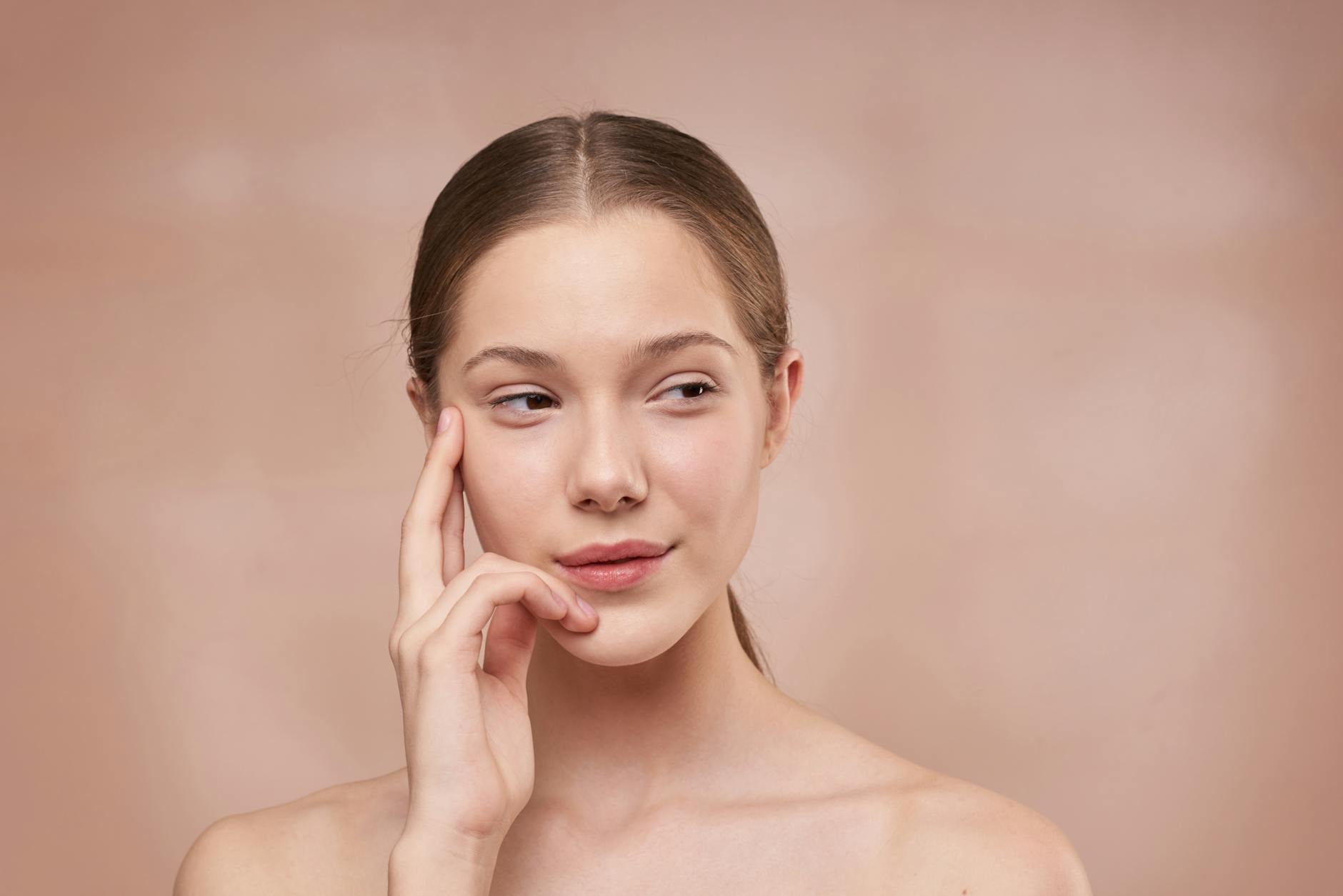 Smooth Skin After Facial Hair Removal 2026 Woman with naturally smooth skin — the goal of understanding facial hair removal before and after