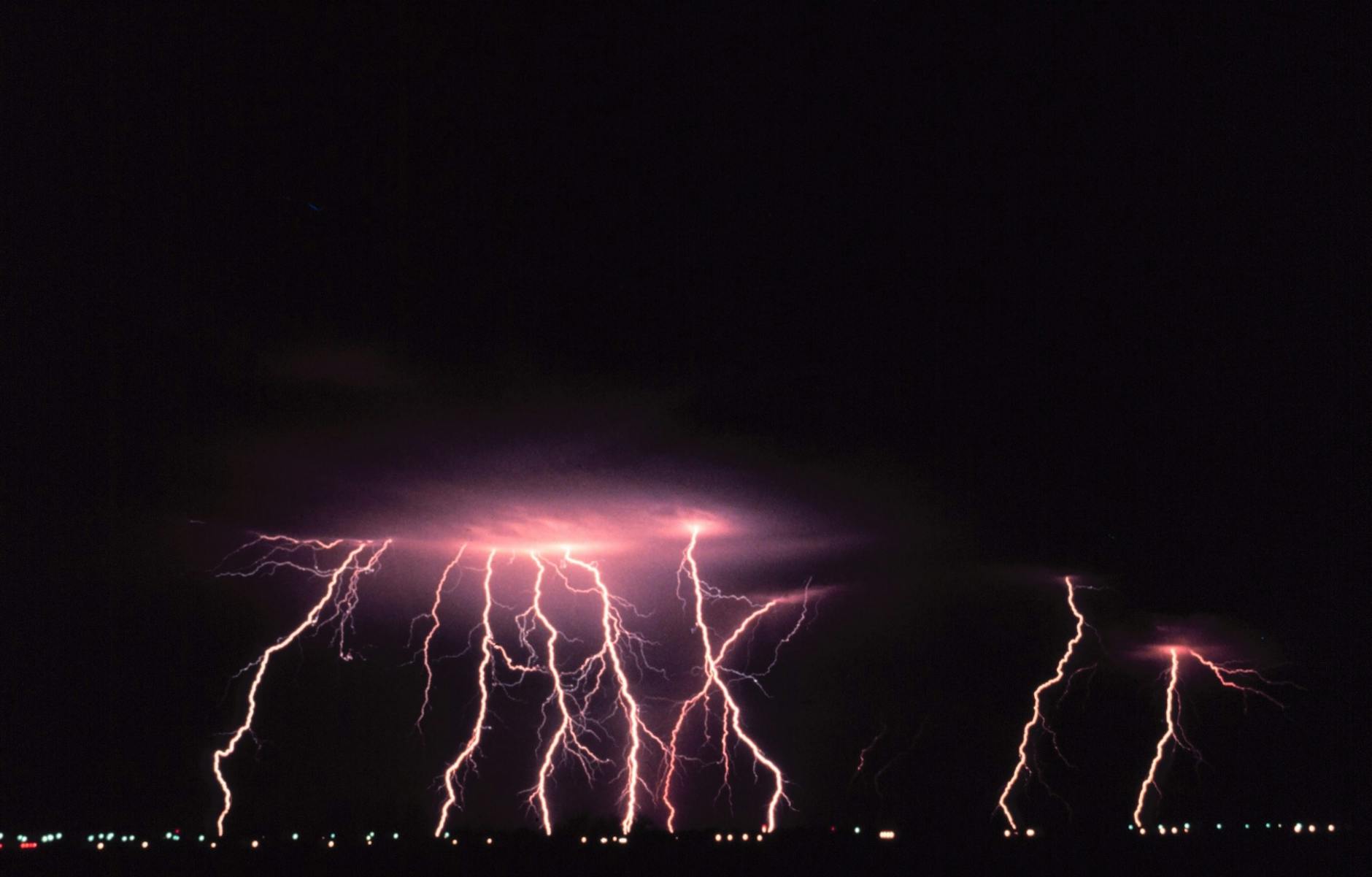 Natural Disaster Storm - Emergency Preparedness 2026 Lightning storm over a city illustrating the unpredictability of natural disasters