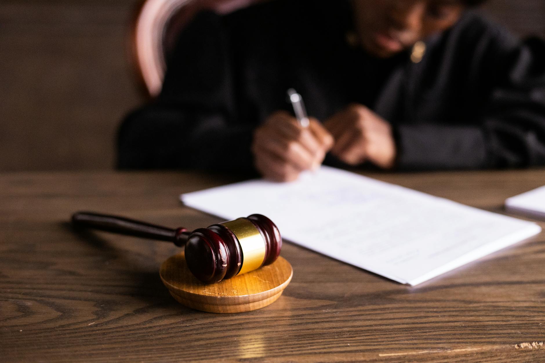 Signing Estate Planning Documents Legal documents being reviewed and signed during estate planning process
