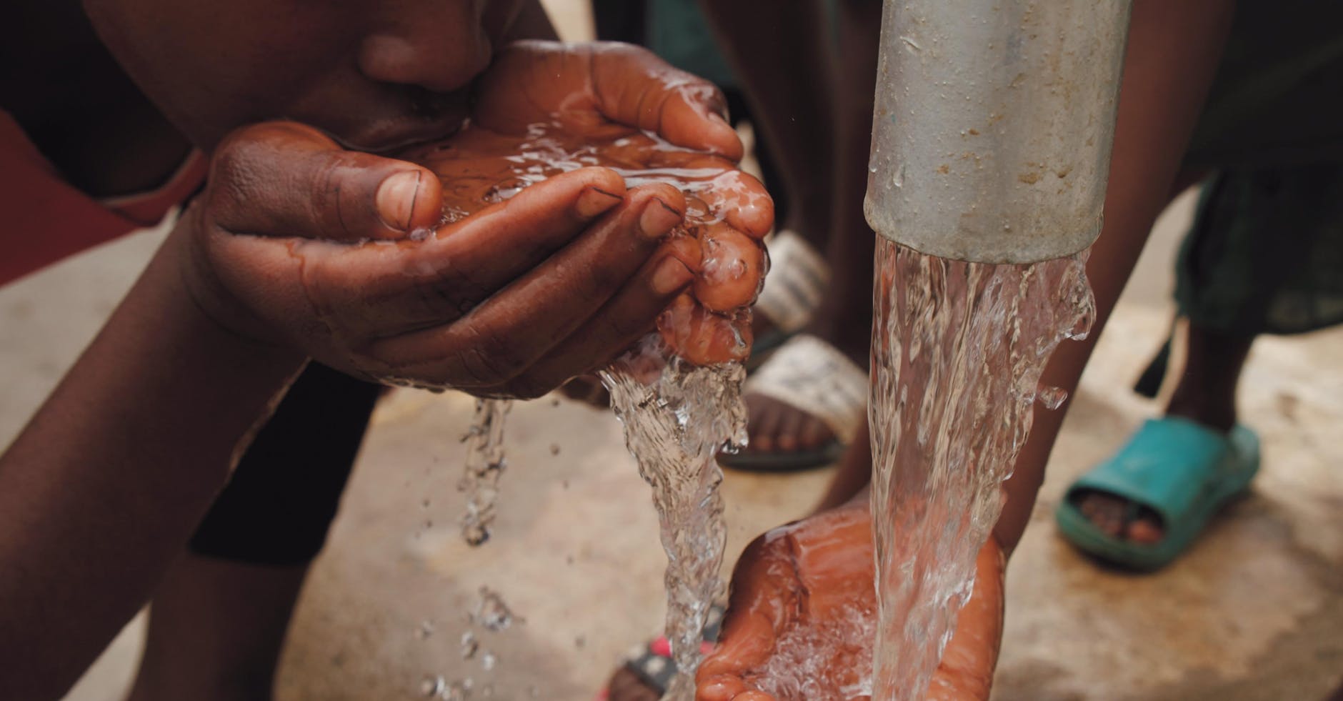 Tap Water as a Source of Fluoride - Fluoride-Free Dental Care Context Running tap water representing fluoride sources in daily life