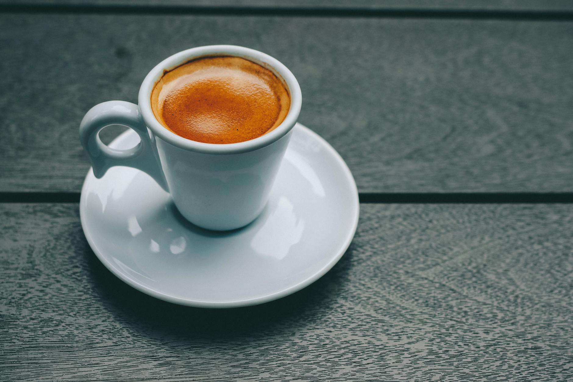 Coffee and Tooth Staining 2026 A shot of espresso in a porcelain cup — one of the leading causes of extrinsic tooth staining