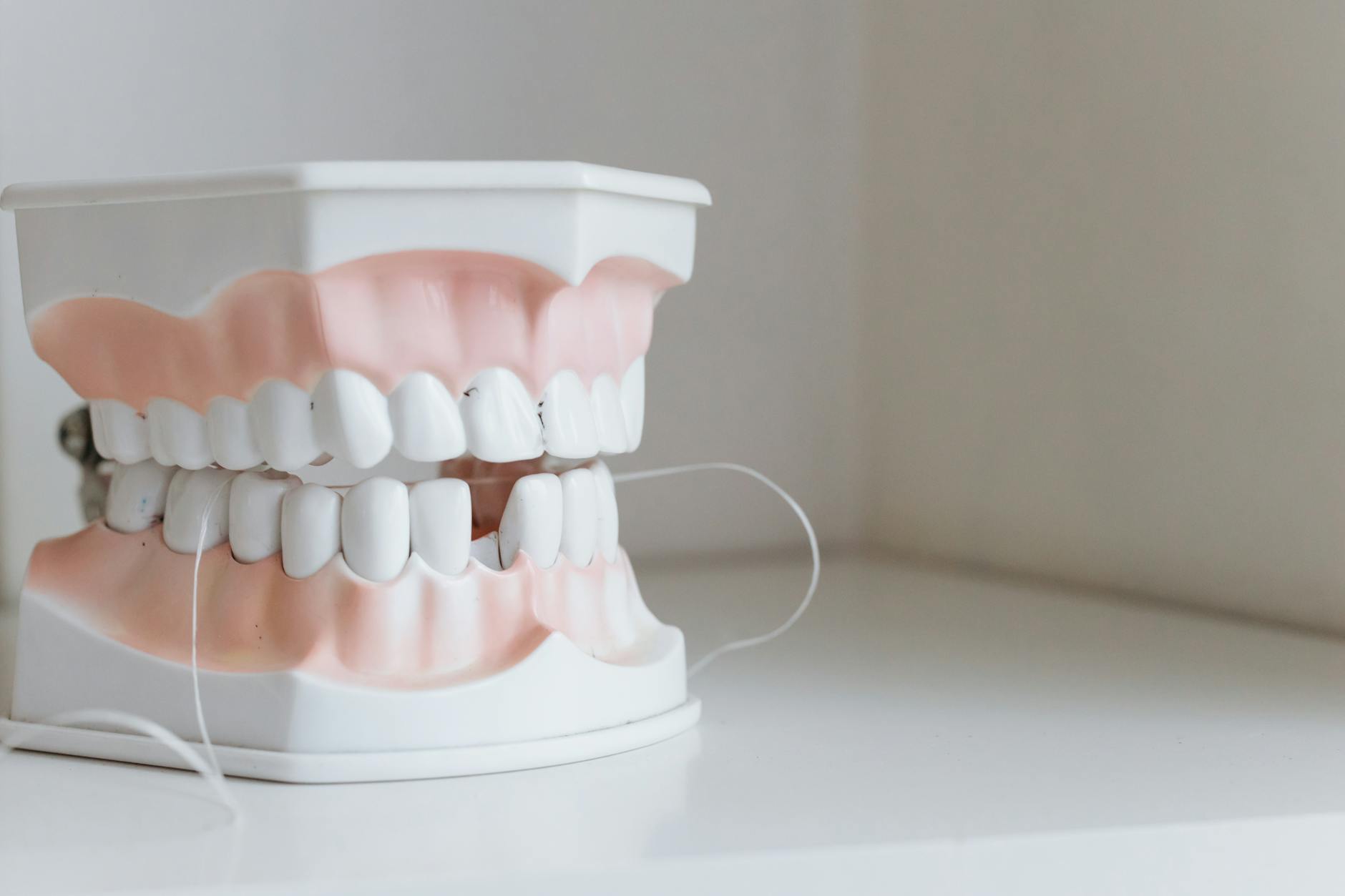 Oral Hygiene Habits to Prevent Teeth Staining Dental floss and oral hygiene tools — daily habits that help prevent teeth staining