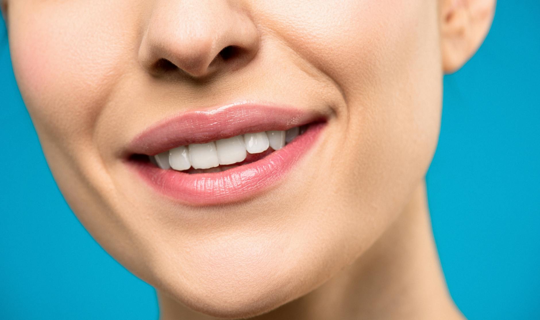 Healthy Enamel - Nano Hydroxyapatite Teeth Science Close-up of healthy white teeth demonstrating the kind of enamel integrity that nano hydroxyapatite toothpaste aims to preserve