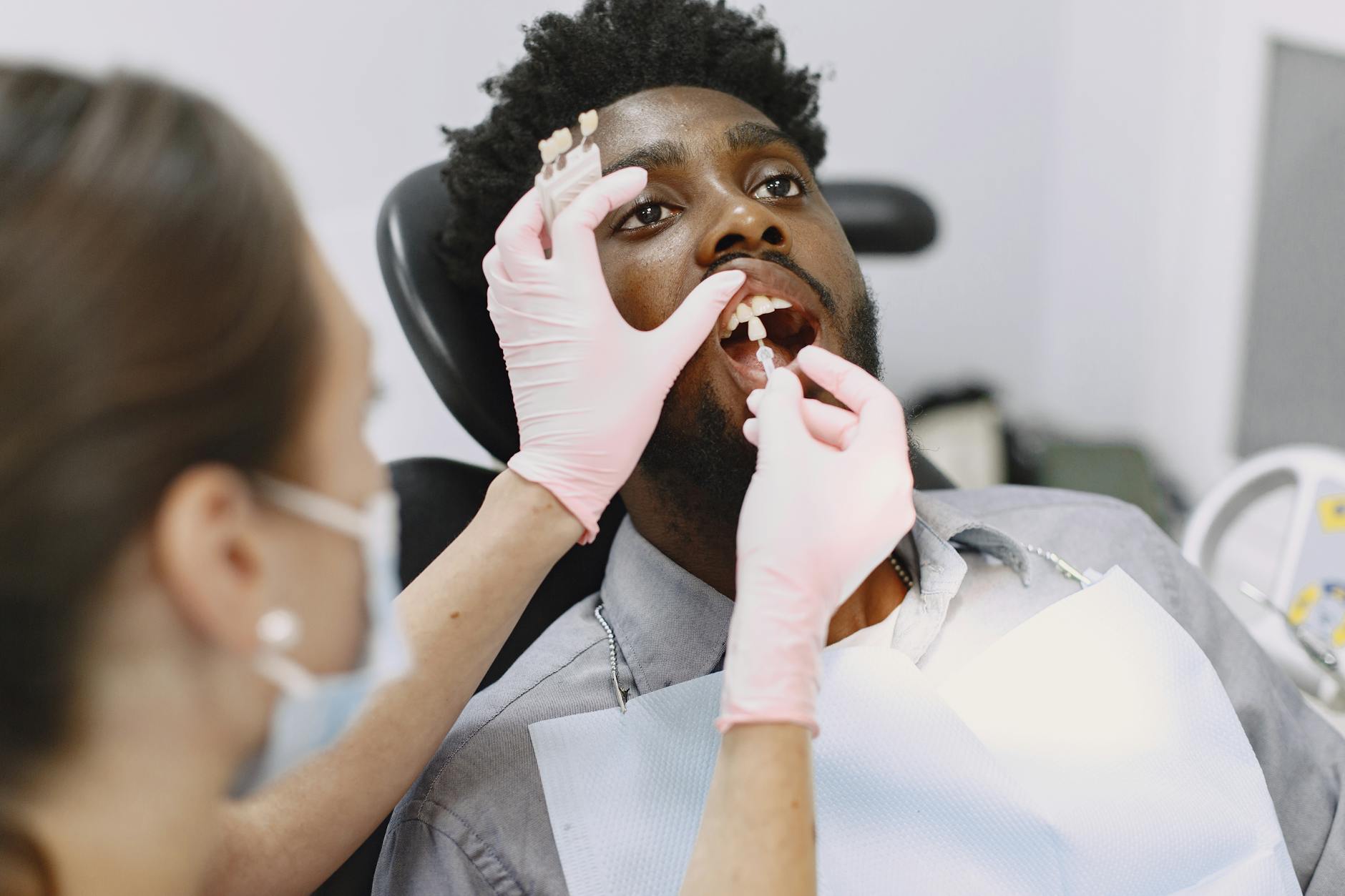 Dental Checkup and Periodontal Disease Prevention Patient receiving a dental checkup — regular dental visits are a key part of preventing periodontal disease and reducing cardiovascular risk