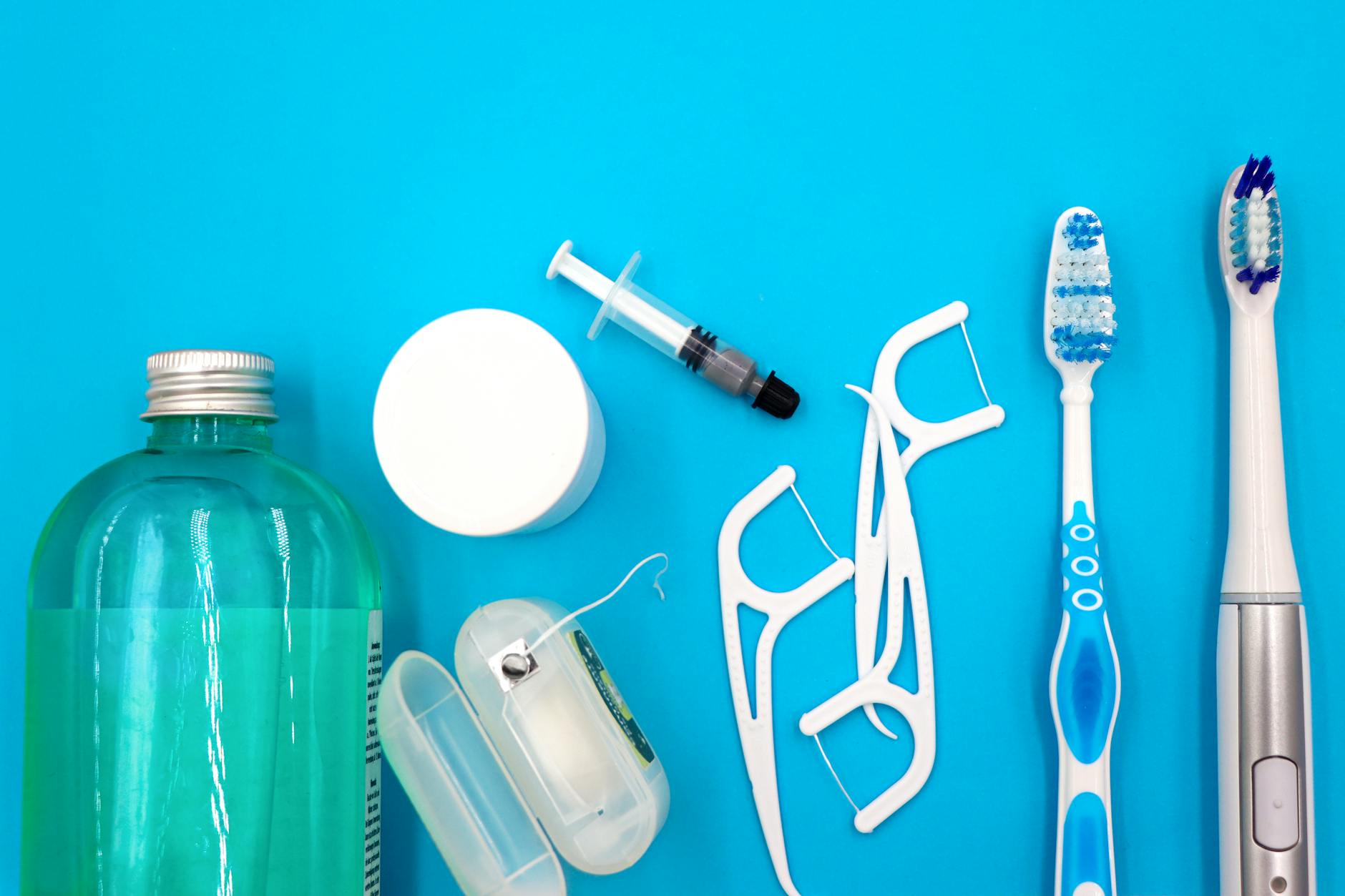 Complete Oral Hygiene Routine for Systemic Health Oral hygiene essentials including toothbrushes, floss, and mouthwash — a complete daily oral care routine is one of the most impactful investments in long-term systemic health