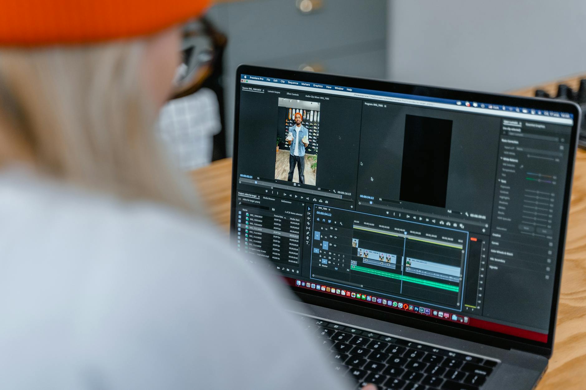 Photo Management Software on Laptop — Digital Organization Tools Photo editing and management software displayed on a laptop screen, showing a professional workflow