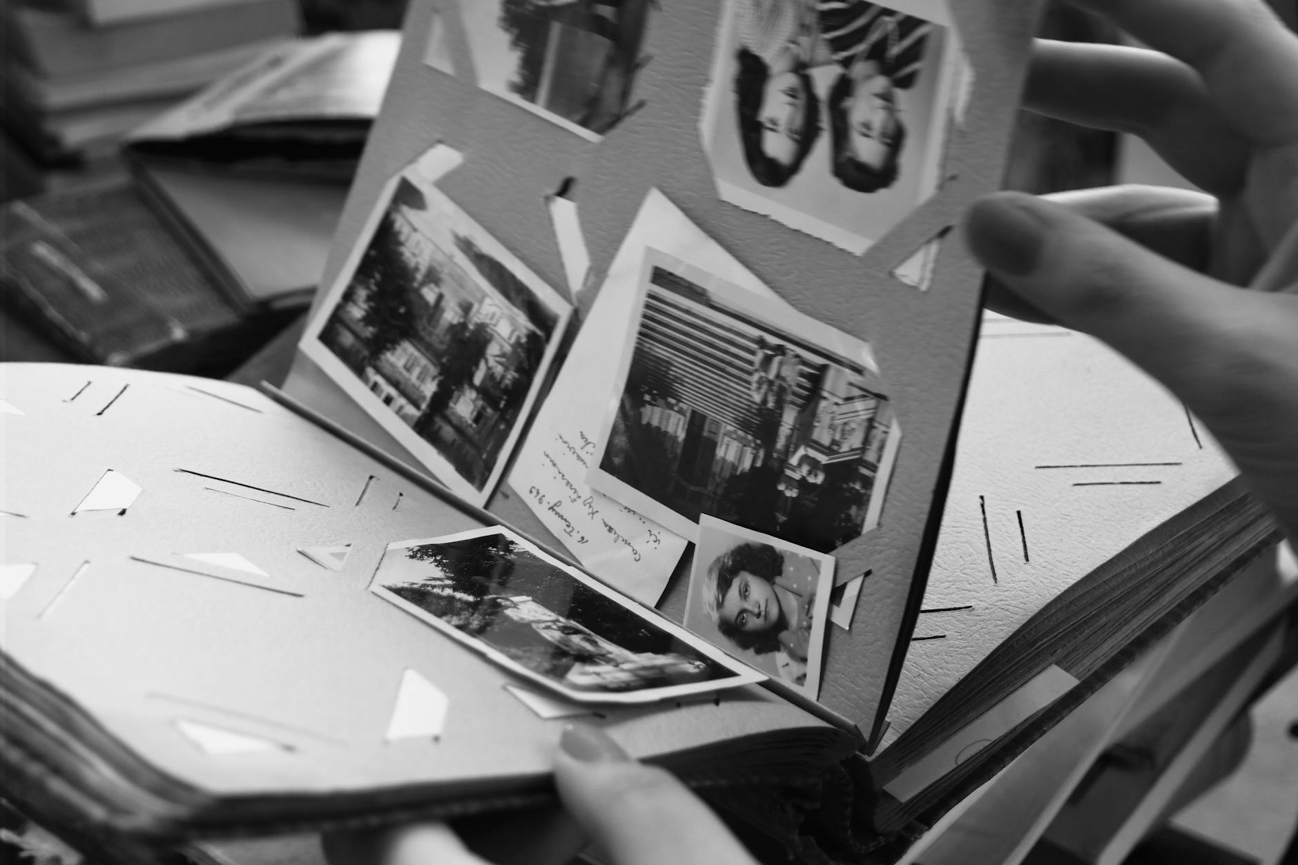 Printed Photo Album — A Lasting Way to Preserve and Share Family History Classic black and white photo album open on a table — printed photo books preserve family memories for generations