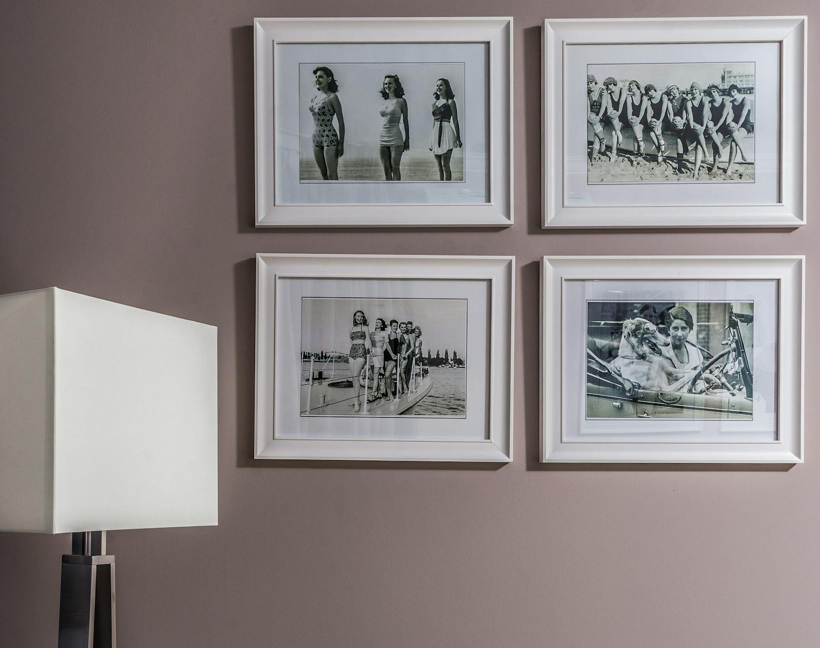 Displaying Family Photos on a Wall — Digital and Print Options Vintage black and white framed photos displayed on a wall — a timeless way to share family memories