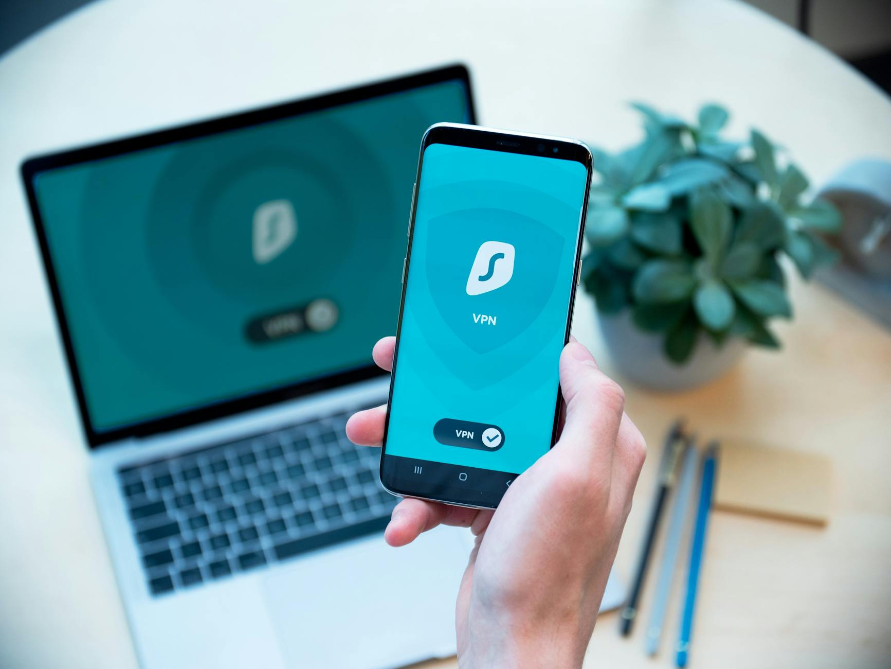 Smartphone VPN for Personal Data Protection 2026 Person holding smartphone with VPN app for data protection