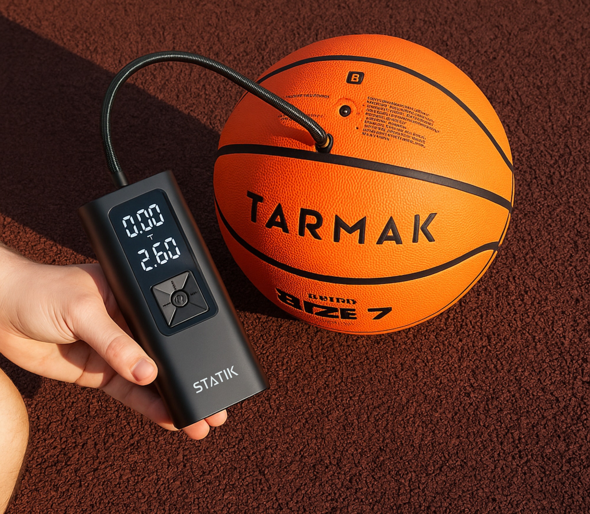 TireHero Portable Wireless Tire Inflator 2026 — Size Reference TireHero wireless tire inflator held in hand showing compact size