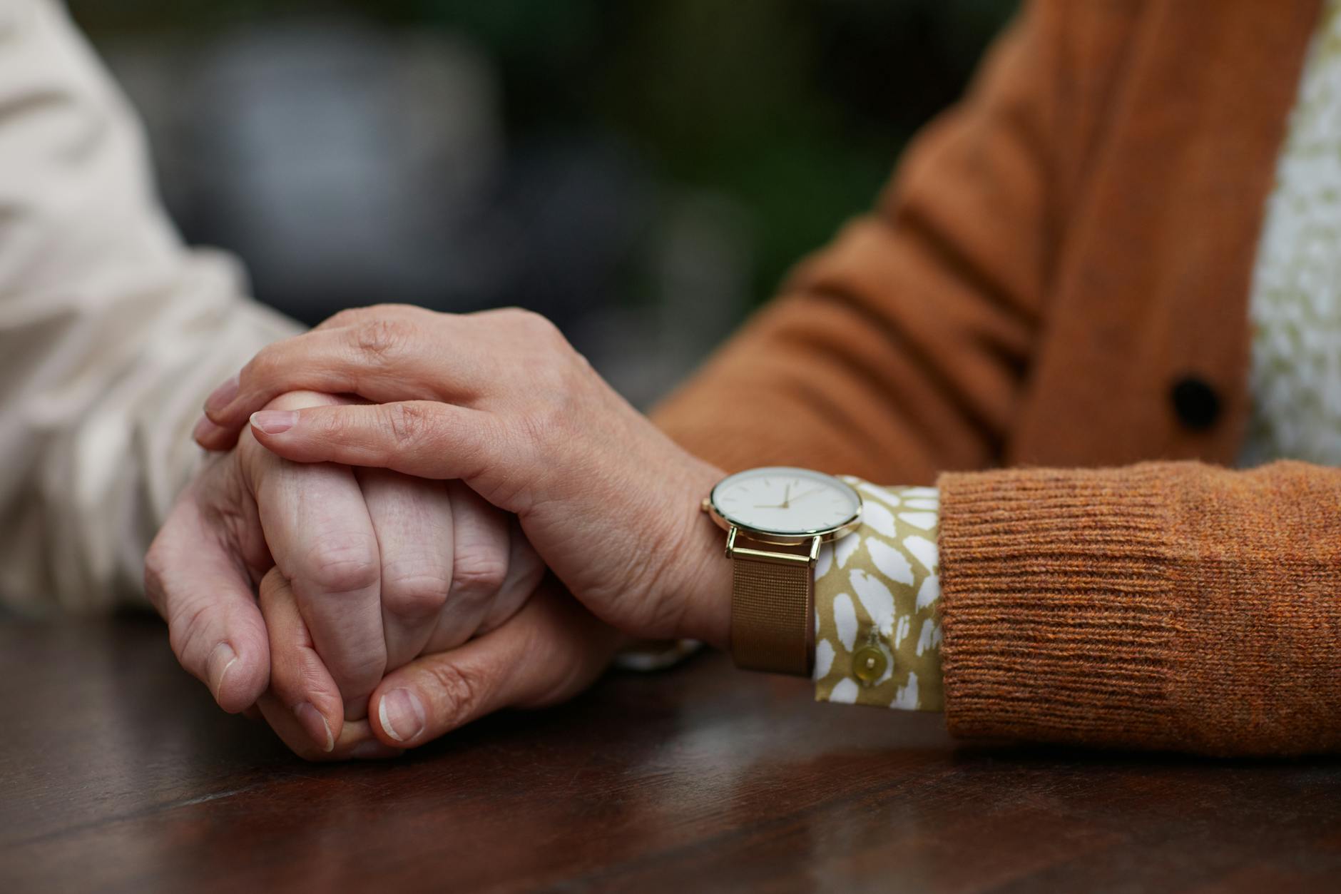 Close Relationships and Hearing Health Senior couple holding hands, representing the importance of maintaining close relationships when managing hearing loss