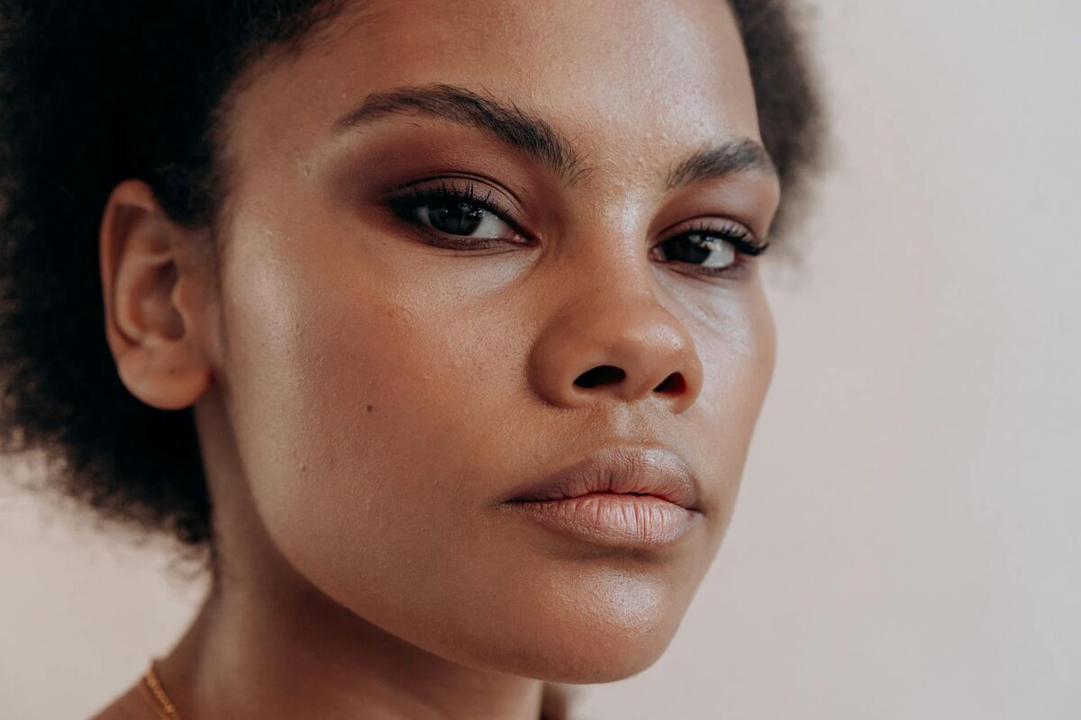Flawless Makeup on Smooth Skin Close-up of woman with flawless, smooth skin and beautifully applied makeup