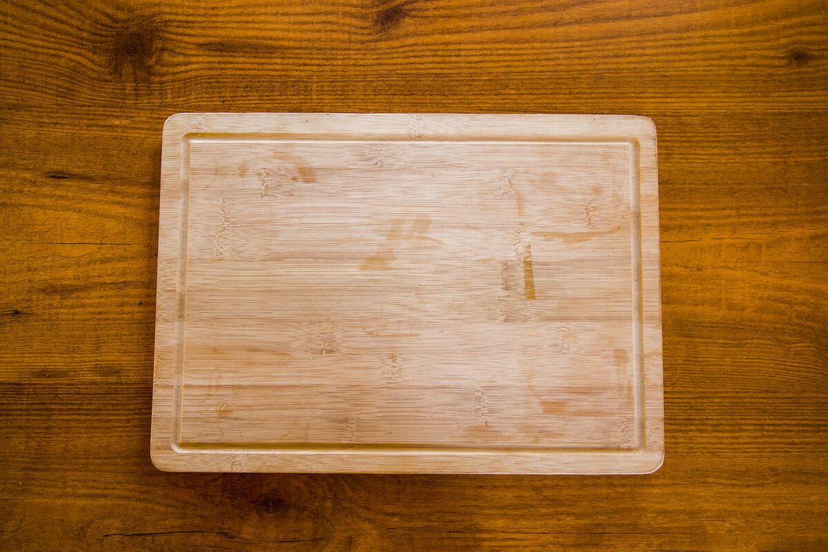 Wooden Cutting Board Surface Texture 2026 Natural wooden bamboo chopping board seen from above